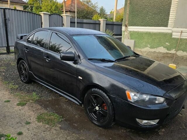 Чорний Міцубісі Lancer, об'ємом двигуна 2 л та пробігом 223 тис. км за 6200 $, фото 1 на Automoto.ua