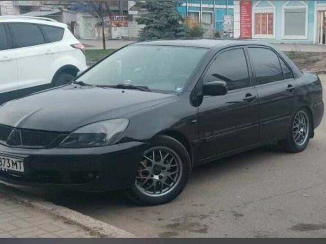 Чорний Міцубісі Lancer, об'ємом двигуна 1.6 л та пробігом 350 тис. км за 4200 $, фото 1 на Automoto.ua