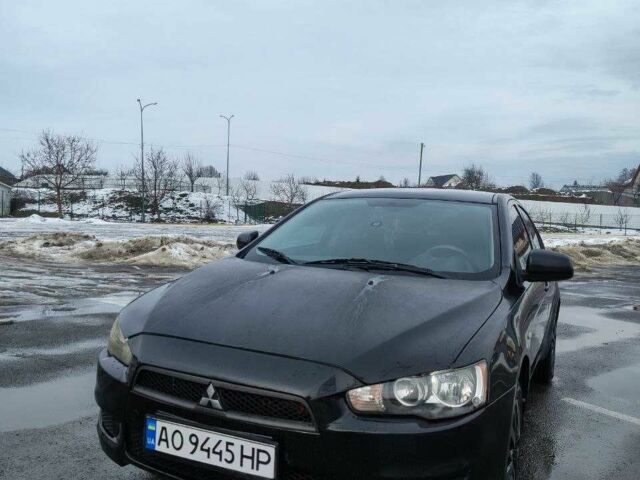 Черный Мицубиси Лансер, объемом двигателя 1.5 л и пробегом 218 тыс. км за 6000 $, фото 1 на Automoto.ua
