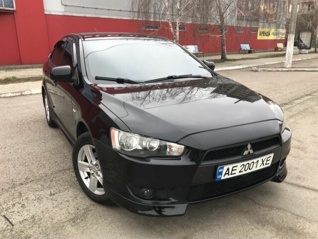 Чорний Міцубісі Lancer, об'ємом двигуна 2 л та пробігом 215 тис. км за 7750 $, фото 1 на Automoto.ua