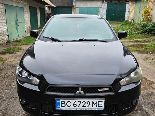 Чорний Міцубісі Lancer, об'ємом двигуна 2 л та пробігом 195 тис. км за 5500 $, фото 1 на Automoto.ua