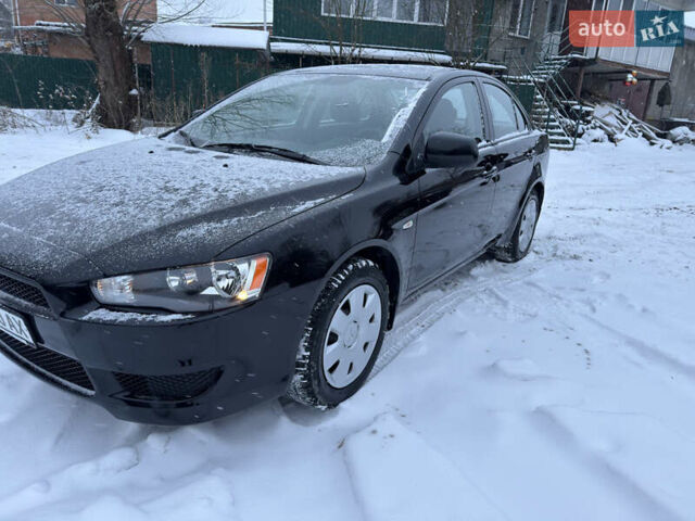 Черный Мицубиси Лансер, объемом двигателя 0 л и пробегом 43 тыс. км за 8700 $, фото 1 на Automoto.ua