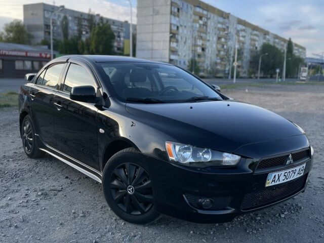 Чорний Міцубісі Lancer, об'ємом двигуна 2 л та пробігом 100 тис. км за 6900 $, фото 1 на Automoto.ua