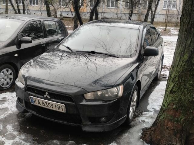 Чорний Міцубісі Lancer, об'ємом двигуна 0.15 л та пробігом 267 тис. км за 7500 $, фото 1 на Automoto.ua