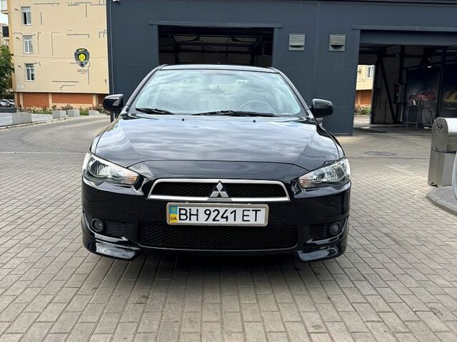 Черный Мицубиси Лансер, объемом двигателя 1.5 л и пробегом 214 тыс. км за 5799 $, фото 1 на Automoto.ua