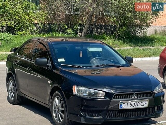 Черный Мицубиси Лансер, объемом двигателя 1.5 л и пробегом 170 тыс. км за 6100 $, фото 1 на Automoto.ua