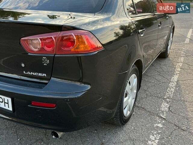 Чорний Міцубісі Lancer, об'ємом двигуна 1.5 л та пробігом 147 тис. км за 5000 $, фото 1 на Automoto.ua