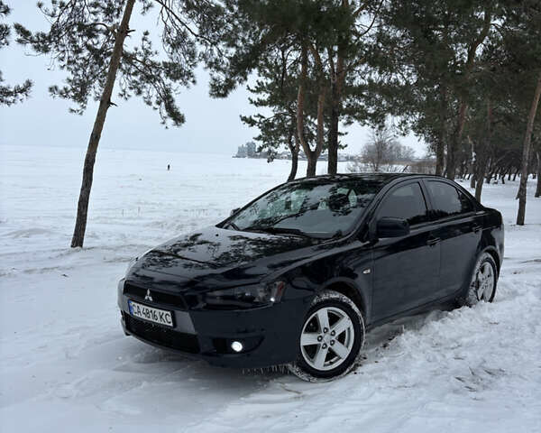 Чорний Міцубісі Lancer, об'ємом двигуна 1.5 л та пробігом 220 тис. км за 7000 $, фото 1 на Automoto.ua
