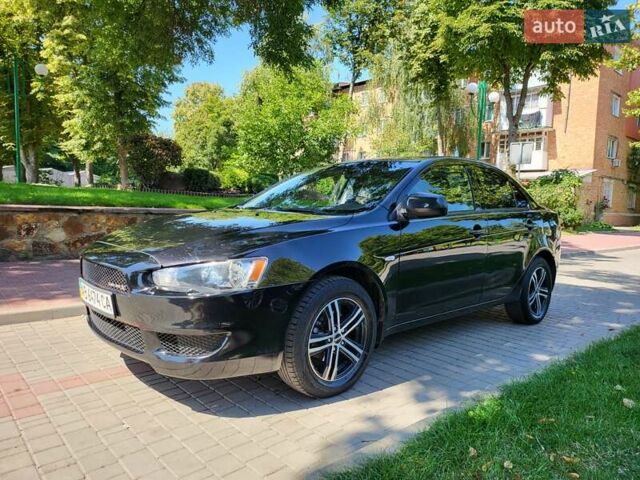 Чорний Міцубісі Lancer, об'ємом двигуна 1.5 л та пробігом 185 тис. км за 7300 $, фото 1 на Automoto.ua
