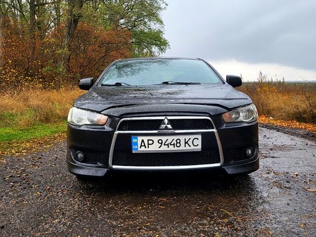 Чорний Міцубісі Lancer, об'ємом двигуна 1.5 л та пробігом 197 тис. км за 7500 $, фото 1 на Automoto.ua