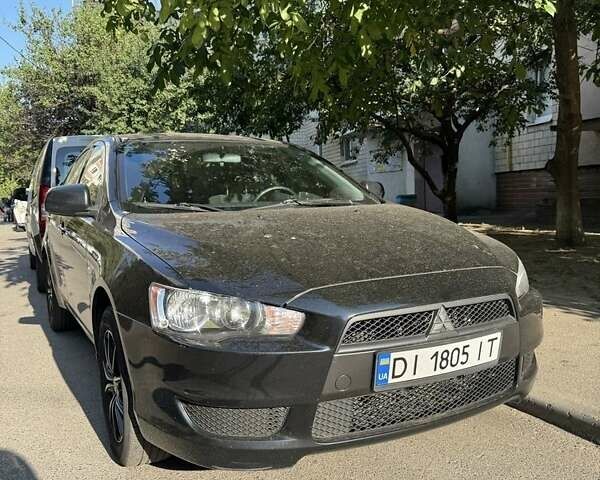 Черный Мицубиси Лансер, объемом двигателя 1.5 л и пробегом 185 тыс. км за 6500 $, фото 1 на Automoto.ua