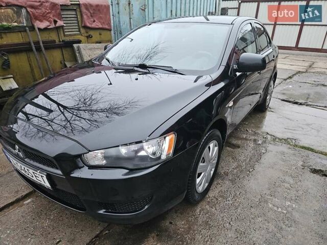 Черный Мицубиси Лансер, объемом двигателя 1.5 л и пробегом 222 тыс. км за 4900 $, фото 1 на Automoto.ua