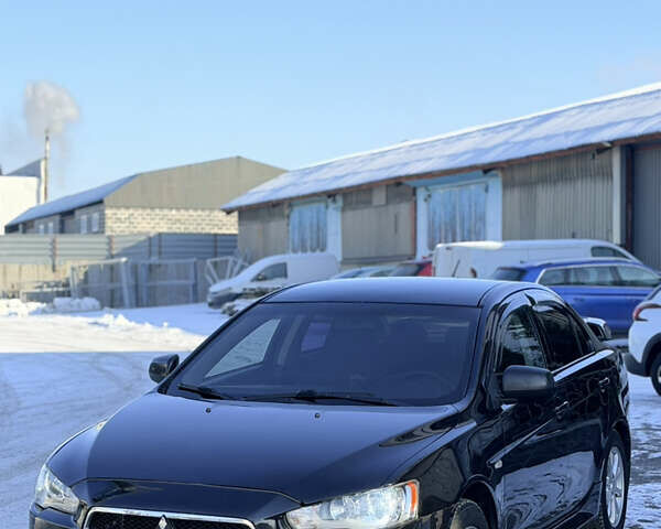 Черный Мицубиси Лансер, объемом двигателя 1.5 л и пробегом 192 тыс. км за 6300 $, фото 1 на Automoto.ua