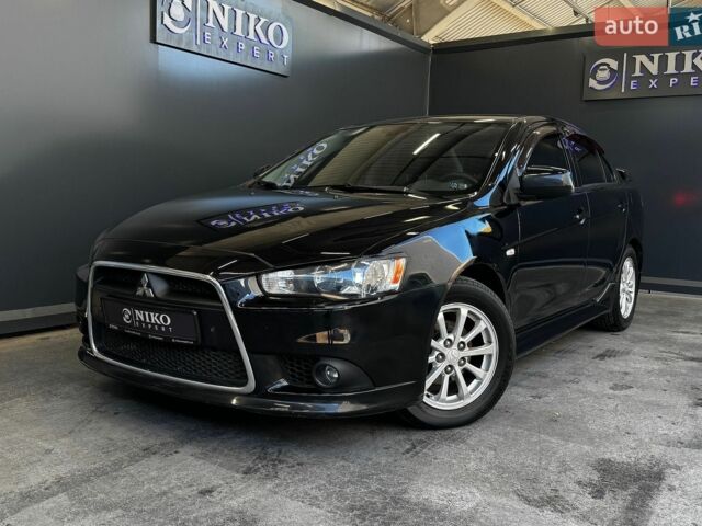 Чорний Міцубісі Lancer, об'ємом двигуна 2 л та пробігом 260 тис. км за 5800 $, фото 1 на Automoto.ua