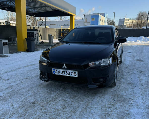 Черный Мицубиси Лансер, объемом двигателя 1.5 л и пробегом 230 тыс. км за 5500 $, фото 1 на Automoto.ua