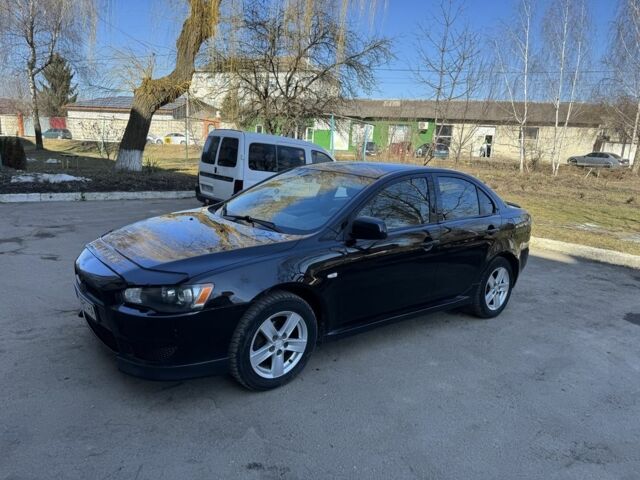 Черный Мицубиси Лансер, объемом двигателя 1.5 л и пробегом 312 тыс. км за 6500 $, фото 1 на Automoto.ua