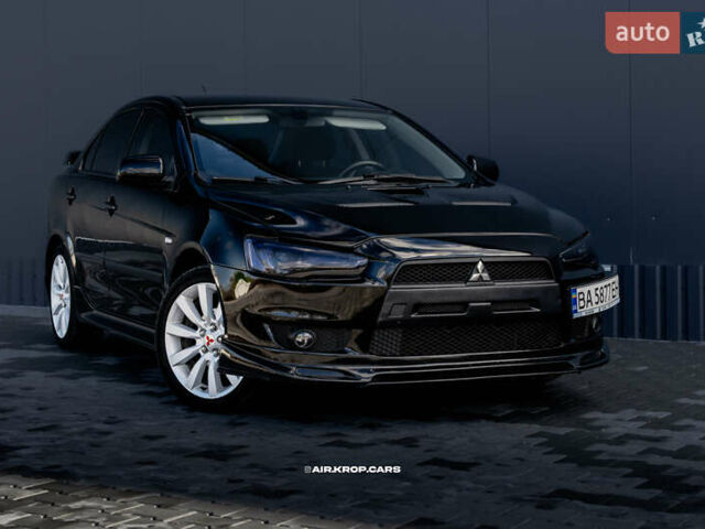 Чорний Міцубісі Lancer, об'ємом двигуна 2 л та пробігом 204 тис. км за 9500 $, фото 1 на Automoto.ua