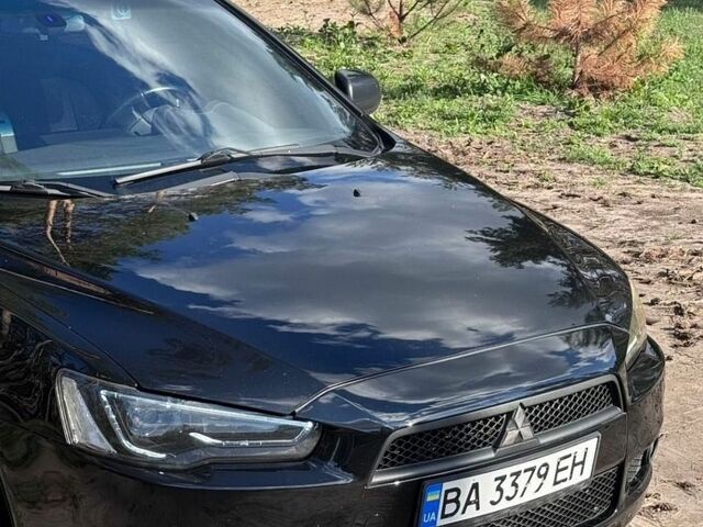 Черный Мицубиси Лансер, объемом двигателя 2 л и пробегом 237 тыс. км за 7900 $, фото 1 на Automoto.ua