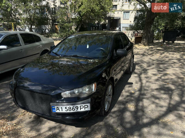 Черный Мицубиси Лансер, объемом двигателя 1.5 л и пробегом 167 тыс. км за 6800 $, фото 1 на Automoto.ua