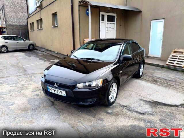 Черный Мицубиси Лансер, объемом двигателя 1.5 л и пробегом 215 тыс. км за 7800 $, фото 1 на Automoto.ua