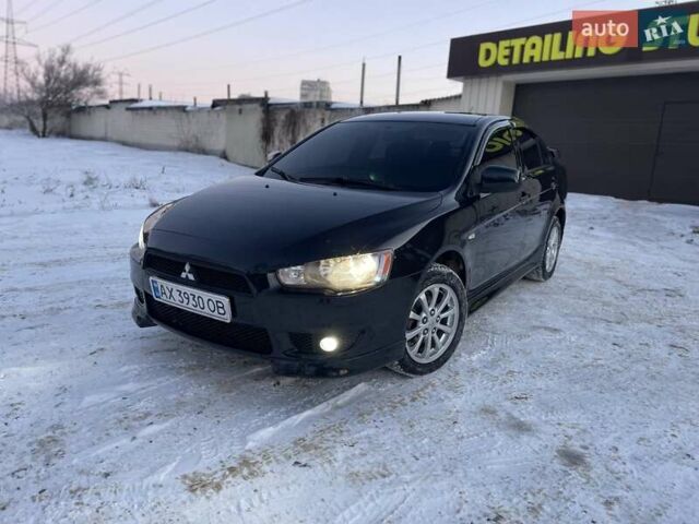 Черный Мицубиси Лансер, объемом двигателя 1.5 л и пробегом 235 тыс. км за 6500 $, фото 1 на Automoto.ua