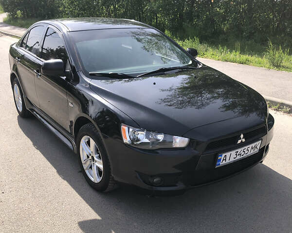 Чорний Міцубісі Lancer, об'ємом двигуна 1.5 л та пробігом 131 тис. км за 8000 $, фото 1 на Automoto.ua