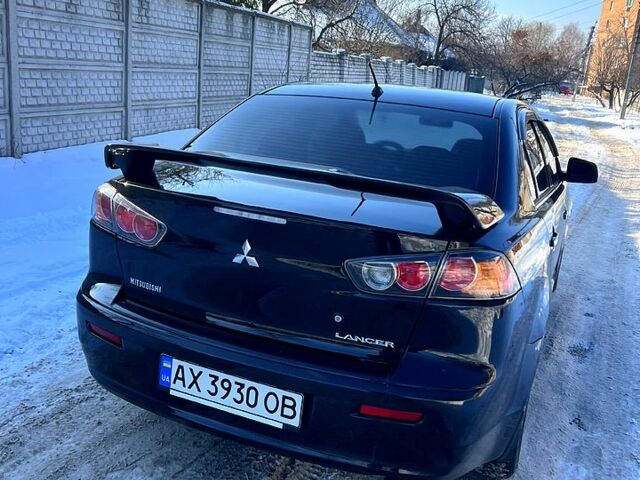 Черный Мицубиси Лансер, объемом двигателя 1.5 л и пробегом 21100 тыс. км за 6200 $, фото 1 на Automoto.ua