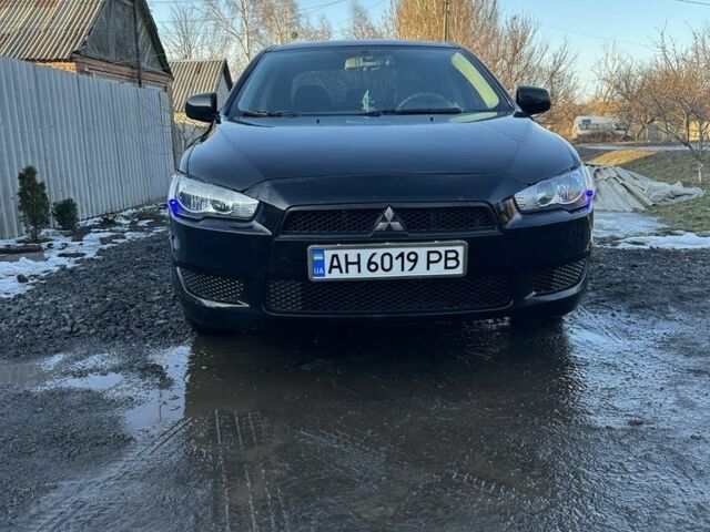 Черный Мицубиси Лансер, объемом двигателя 1.5 л и пробегом 216 тыс. км за 6500 $, фото 1 на Automoto.ua
