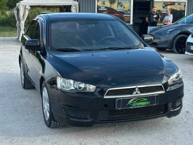 Чорний Міцубісі Lancer, об'ємом двигуна 1.5 л та пробігом 150 тис. км за 5495 $, фото 1 на Automoto.ua