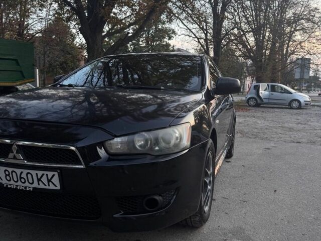 Чорний Міцубісі Lancer, об'ємом двигуна 1.59 л та пробігом 220 тис. км за 6200 $, фото 1 на Automoto.ua