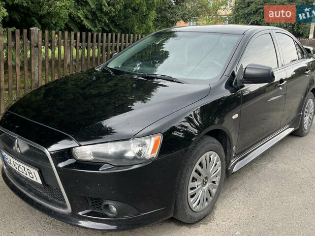 Черный Мицубиси Лансер, объемом двигателя 1.8 л и пробегом 224 тыс. км за 7300 $, фото 1 на Automoto.ua