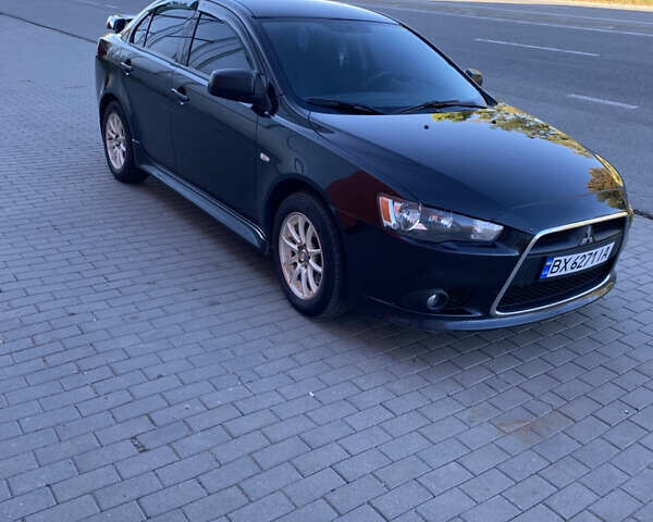 Чорний Міцубісі Lancer, об'ємом двигуна 1.59 л та пробігом 143 тис. км за 7600 $, фото 1 на Automoto.ua