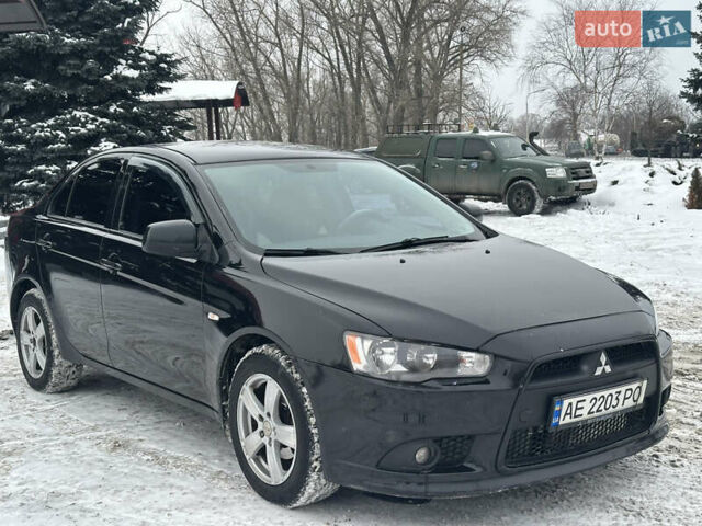 Чорний Міцубісі Lancer, об'ємом двигуна 1.59 л та пробігом 272 тис. км за 6500 $, фото 1 на Automoto.ua