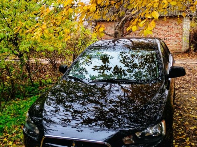 Чорний Міцубісі Lancer, об'ємом двигуна 1.6 л та пробігом 105 тис. км за 9500 $, фото 1 на Automoto.ua