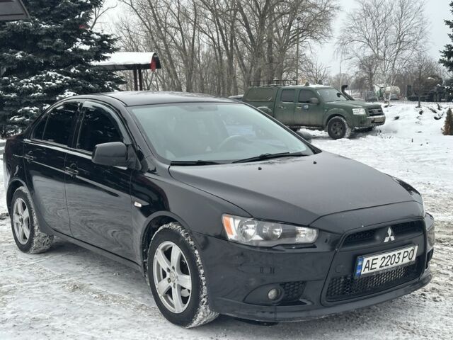 Черный Мицубиси Лансер, объемом двигателя 1.6 л и пробегом 272 тыс. км за 6500 $, фото 1 на Automoto.ua