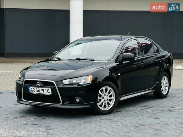 Черный Мицубиси Лансер, объемом двигателя 1.6 л и пробегом 216 тыс. км за 7200 $, фото 1 на Automoto.ua