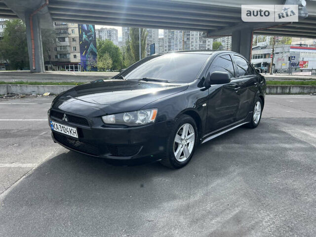 Чорний Міцубісі Lancer, об'ємом двигуна 2 л та пробігом 183 тис. км за 6500 $, фото 1 на Automoto.ua