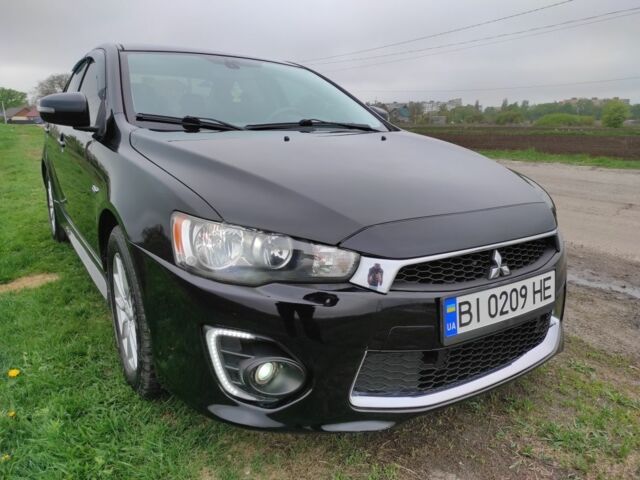 Чорний Міцубісі Lancer, об'ємом двигуна 2 л та пробігом 135 тис. км за 8700 $, фото 1 на Automoto.ua