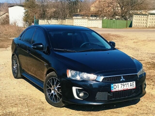 Чорний Міцубісі Lancer, об'ємом двигуна 2 л та пробігом 135 тис. км за 11000 $, фото 1 на Automoto.ua