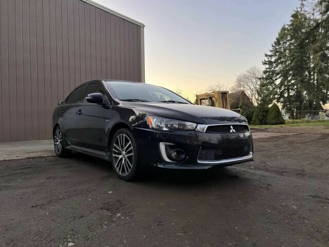 Черный Мицубиси Лансер, объемом двигателя 2.4 л и пробегом 73 тыс. км за 6500 $, фото 1 на Automoto.ua