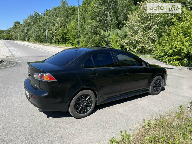 Чорний Міцубісі Lancer, об'ємом двигуна 2 л та пробігом 145 тис. км за 8500 $, фото 1 на Automoto.ua