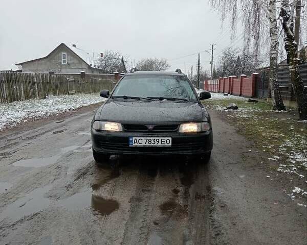 Чорний Міцубісі Lancer, об'ємом двигуна 2 л та пробігом 166 тис. км за 1699 $, фото 1 на Automoto.ua
