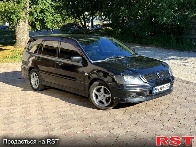 Чорний Міцубісі Lancer, об'ємом двигуна 1.8 л та пробігом 333 тис. км за 975 $, фото 1 на Automoto.ua