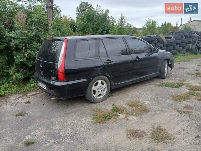 Чорний Міцубісі Lancer, об'ємом двигуна 2 л та пробігом 250 тис. км за 1850 $, фото 1 на Automoto.ua