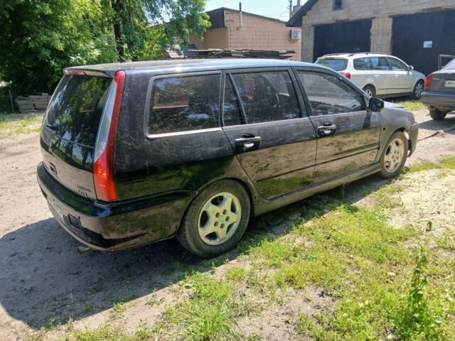 Чорний Міцубісі Lancer, об'ємом двигуна 2 л та пробігом 200 тис. км за 2000 $, фото 1 на Automoto.ua