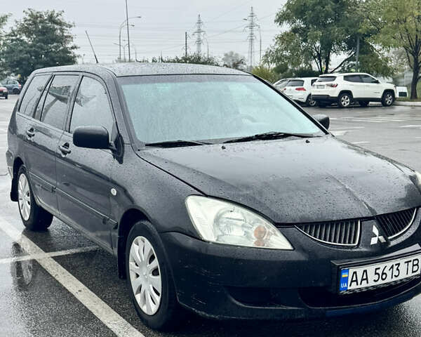 Міцубісі Lancer 2005 у Києві на Automoto.ua Чорний Міцубісі Lancer, об'ємом двигуна 1.6 л та пробігом 408 тис. км за 3900 $, фото 1 на Automoto.ua