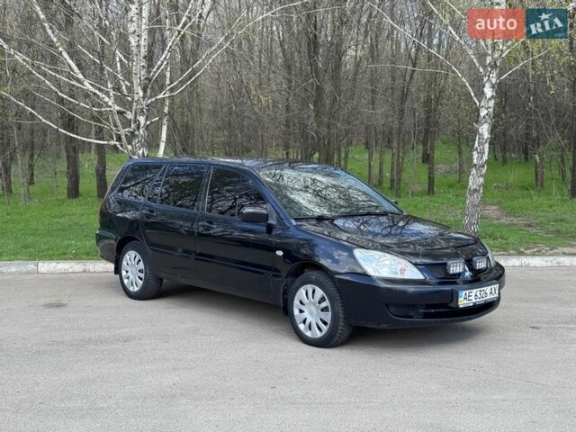 Чорний Міцубісі Lancer, об'ємом двигуна 1.58 л та пробігом 323 тис. км за 2999 $, фото 1 на Automoto.ua