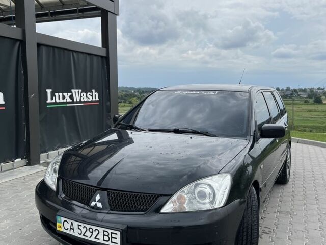 Чорний Міцубісі Lancer, об'ємом двигуна 1.6 л та пробігом 340 тис. км за 3500 $, фото 1 на Automoto.ua