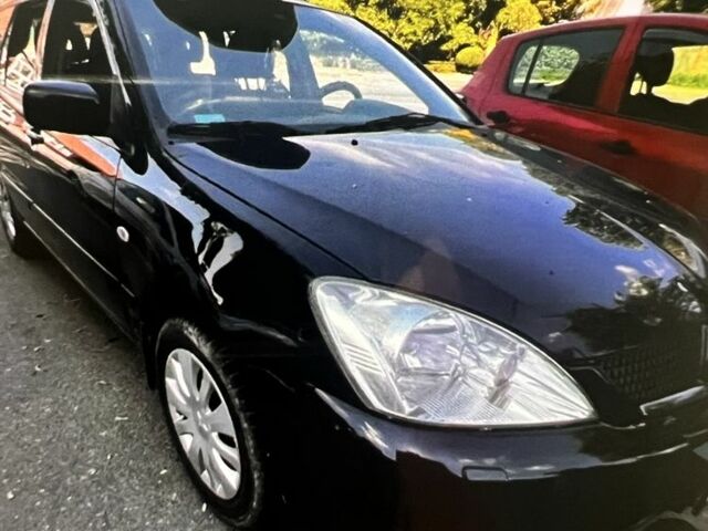 Черный Мицубиси Лансер, объемом двигателя 0 л и пробегом 290 тыс. км за 4000 $, фото 1 на Automoto.ua