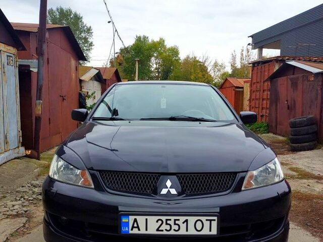 Чорний Міцубісі Lancer, об'ємом двигуна 1.6 л та пробігом 344 тис. км за 4800 $, фото 1 на Automoto.ua